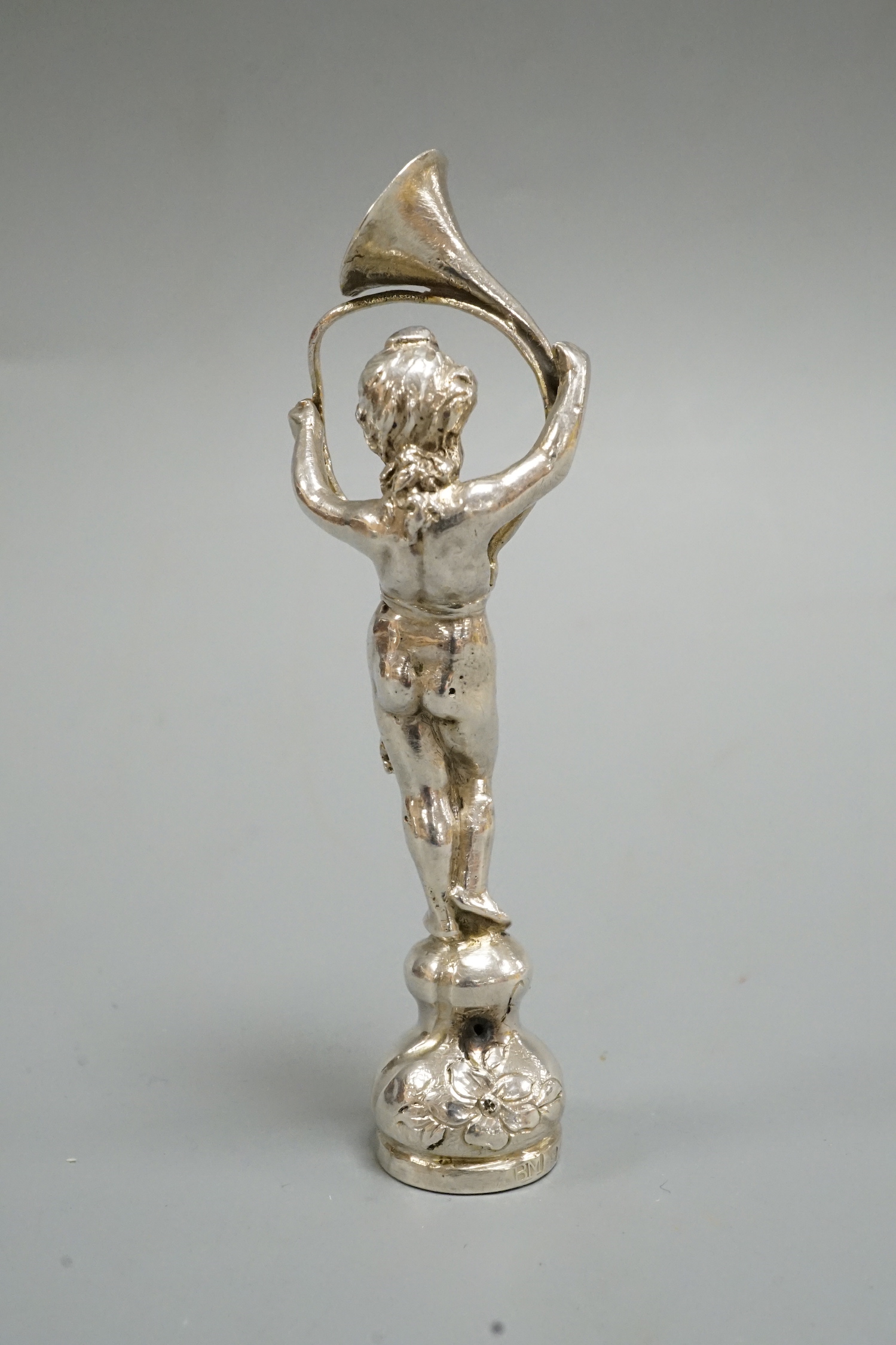 A late 19th century continental silver figural desk seal, import marks for Berthold Muller, London, 1894, 9cm.